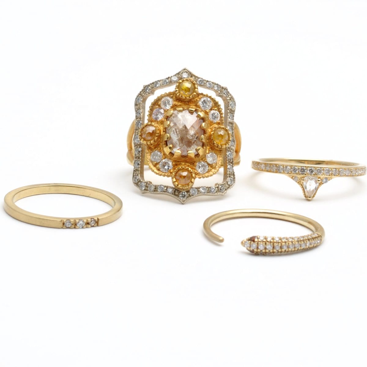 Gold and diamond cocktail ring and stacking rings