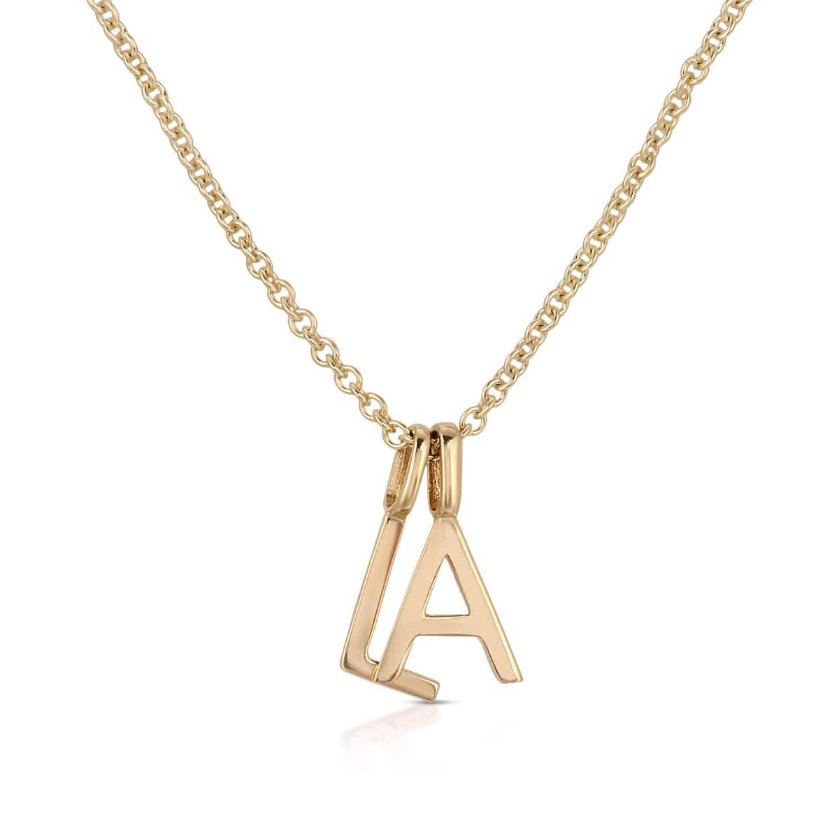 LA Letter charms layered on chain 