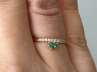 Curved Diamond Band With Offset Emerald