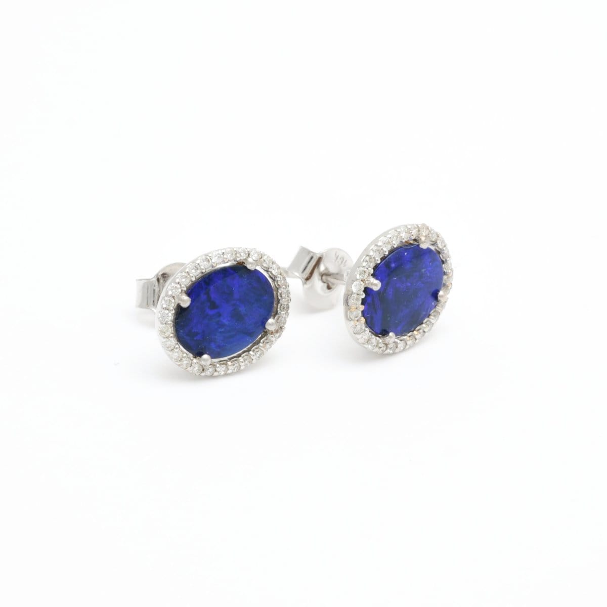 Diamond halo around blue boulder opal