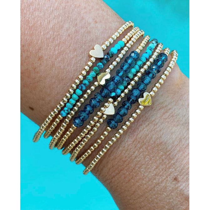 2MM YELLOW GOLD BRACELET WITH 14K HEART BEAD