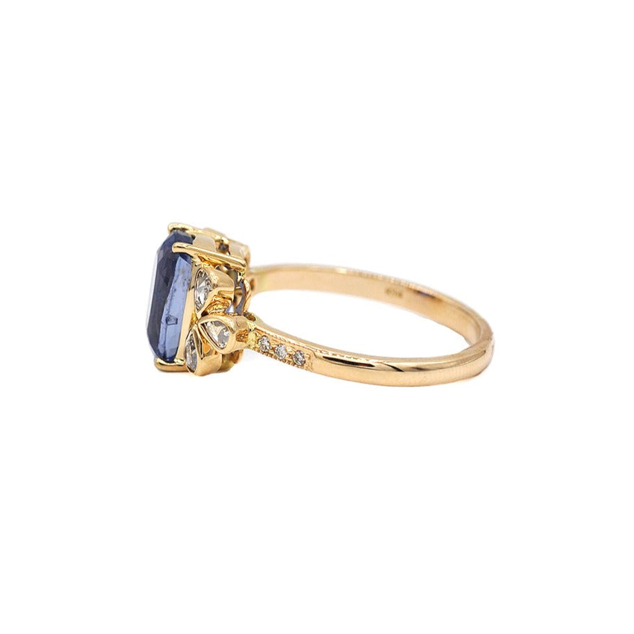 14K Blue Sapphire with Pear Shaped Side Diamonds Ring